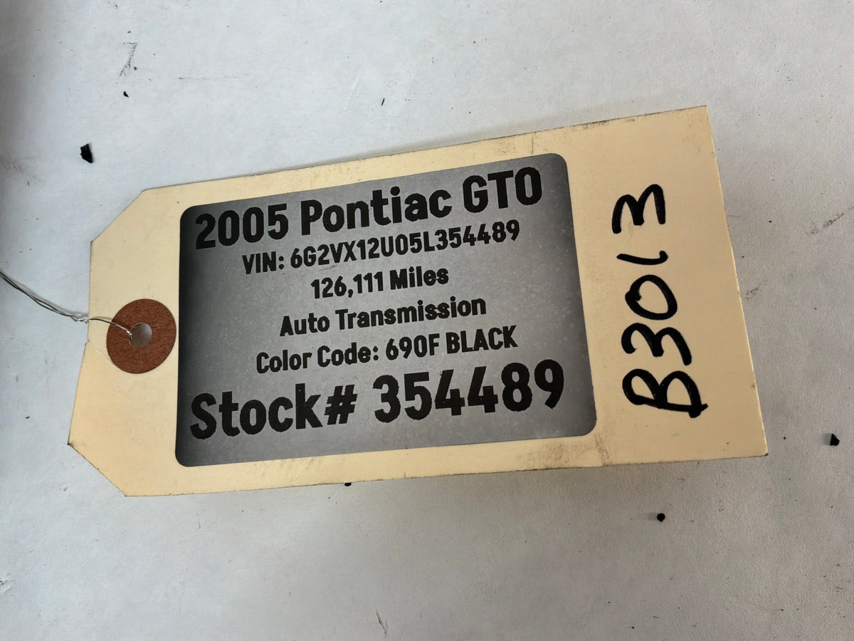 2005 Pontiac GTO Black Suede Lower Dash Knee Bolster Fuse Cover OEM