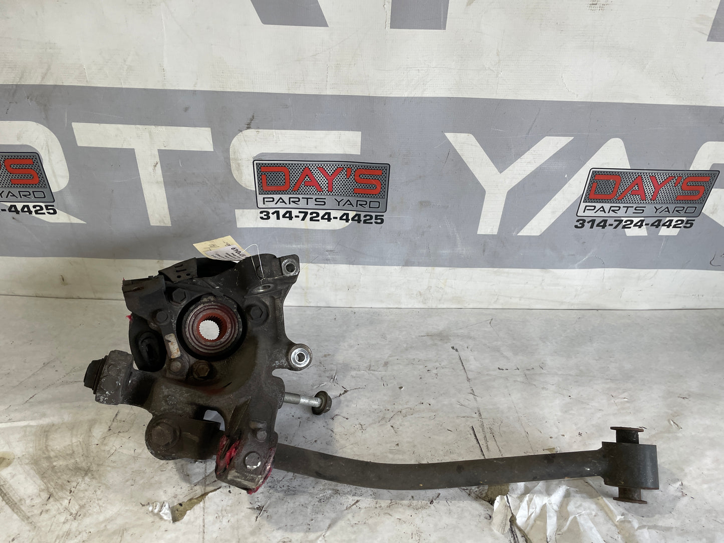 2004 Cadillac CTS-V Rear LH Driver Knuckle Spindle Hub w/ Control Arm OEM - Day's Parts Yard