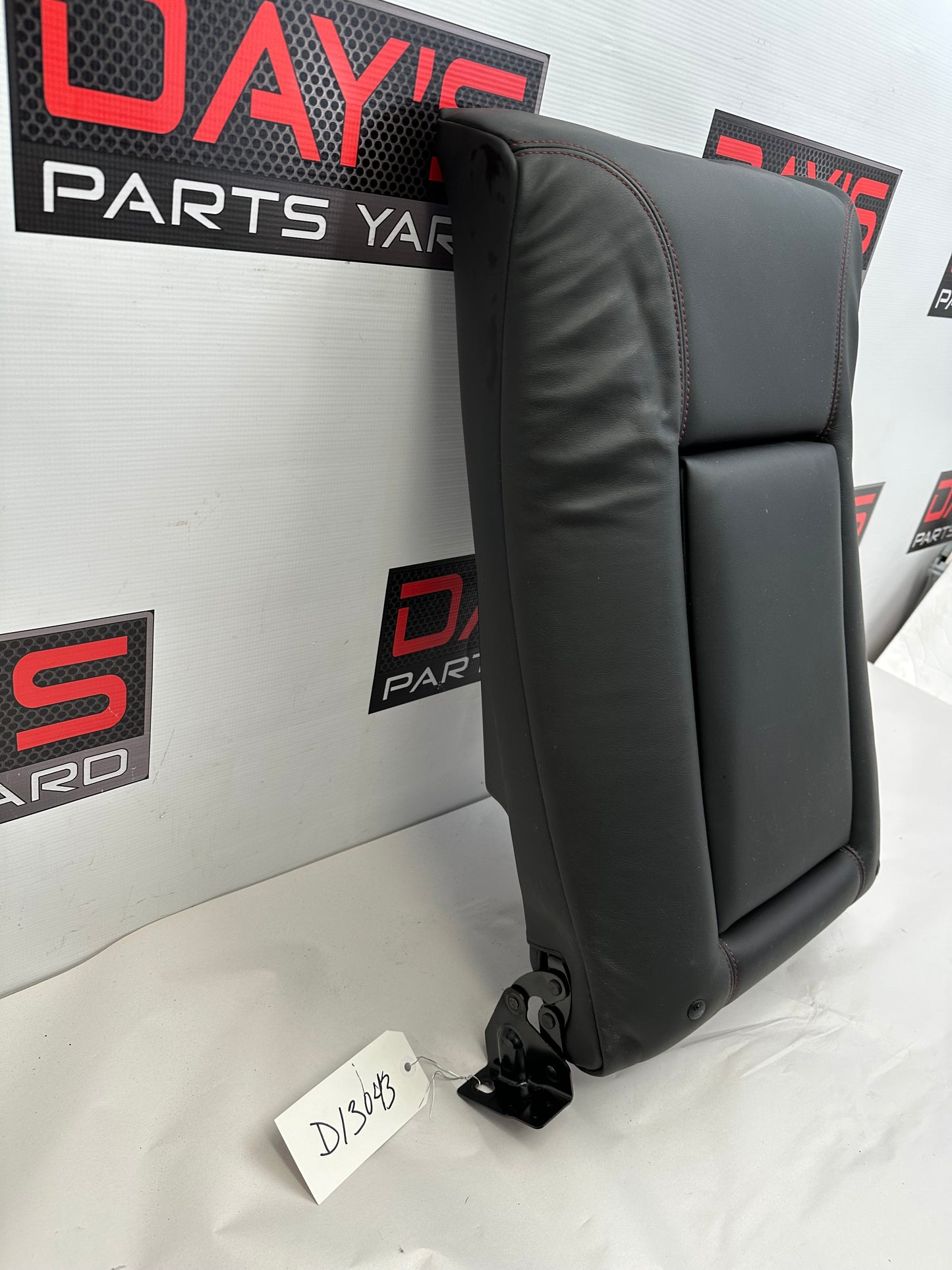2015 Chevy SS Sedan Rear Seat Top Middle Section Cup Holder OEM - Day's Parts Yard