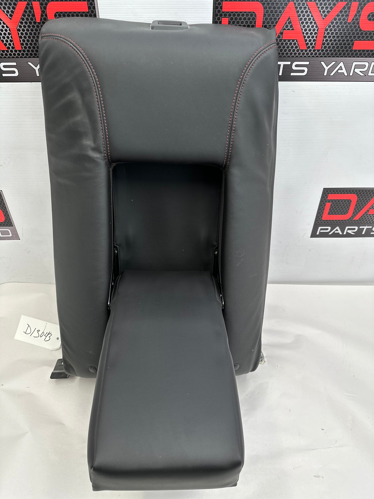 2015 Chevy SS Sedan Rear Seat Top Middle Section Cup Holder OEM - Day's Parts Yard