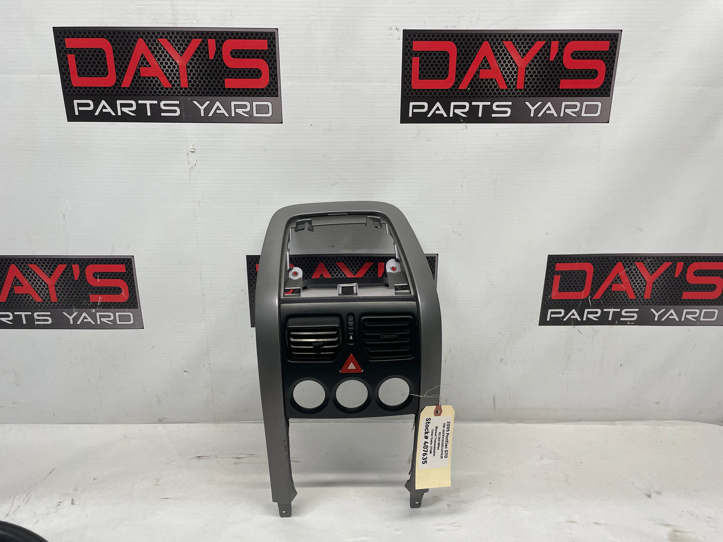 2005 Pontiac GTO Center Dash Radio HVAC Bezel Plate Panel Trim OEM - Day's Parts Yard
