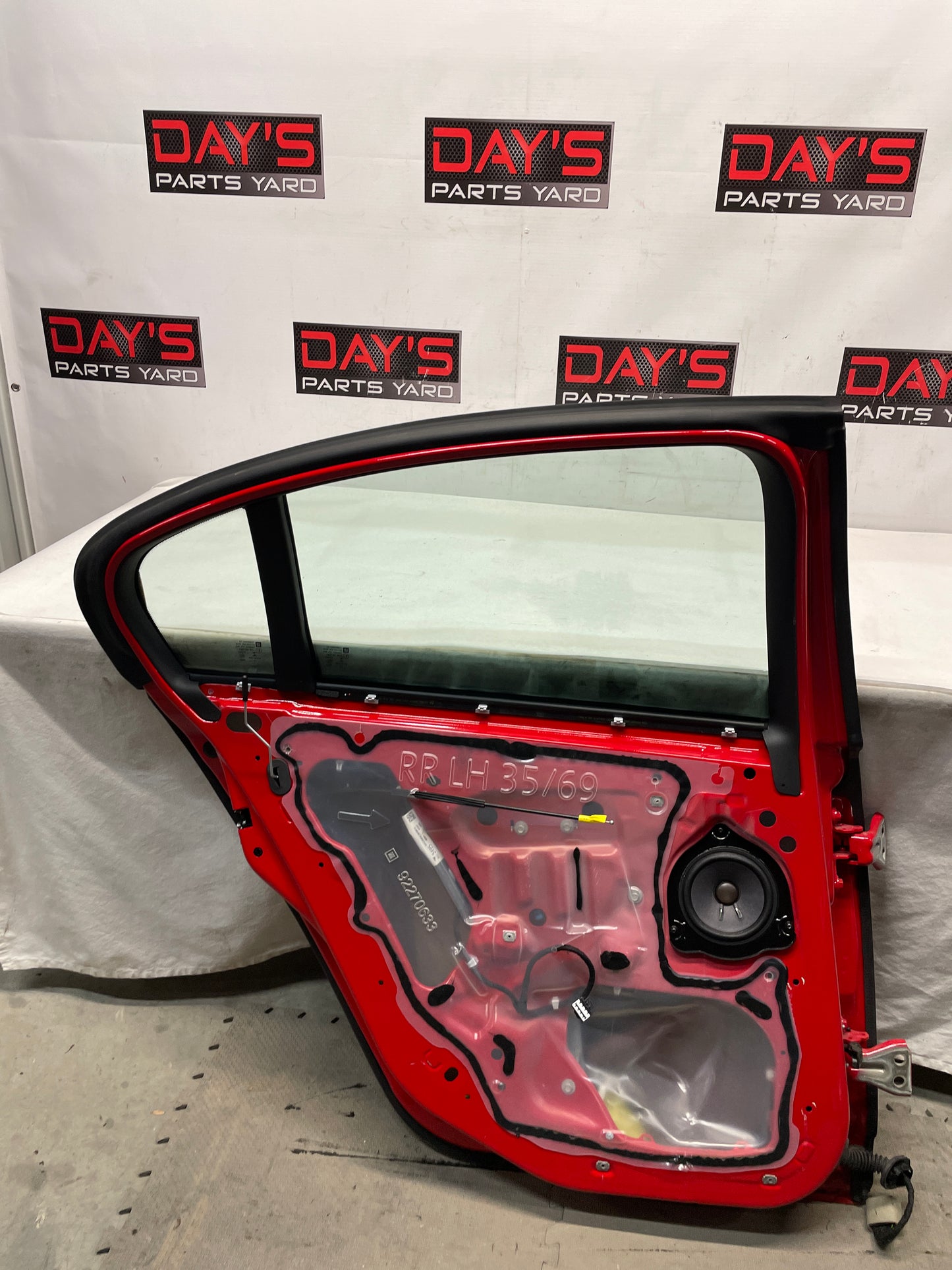 2017 Chevy SS Sedan LH Driver Rear Door Red OEM - Day's Parts Yard
