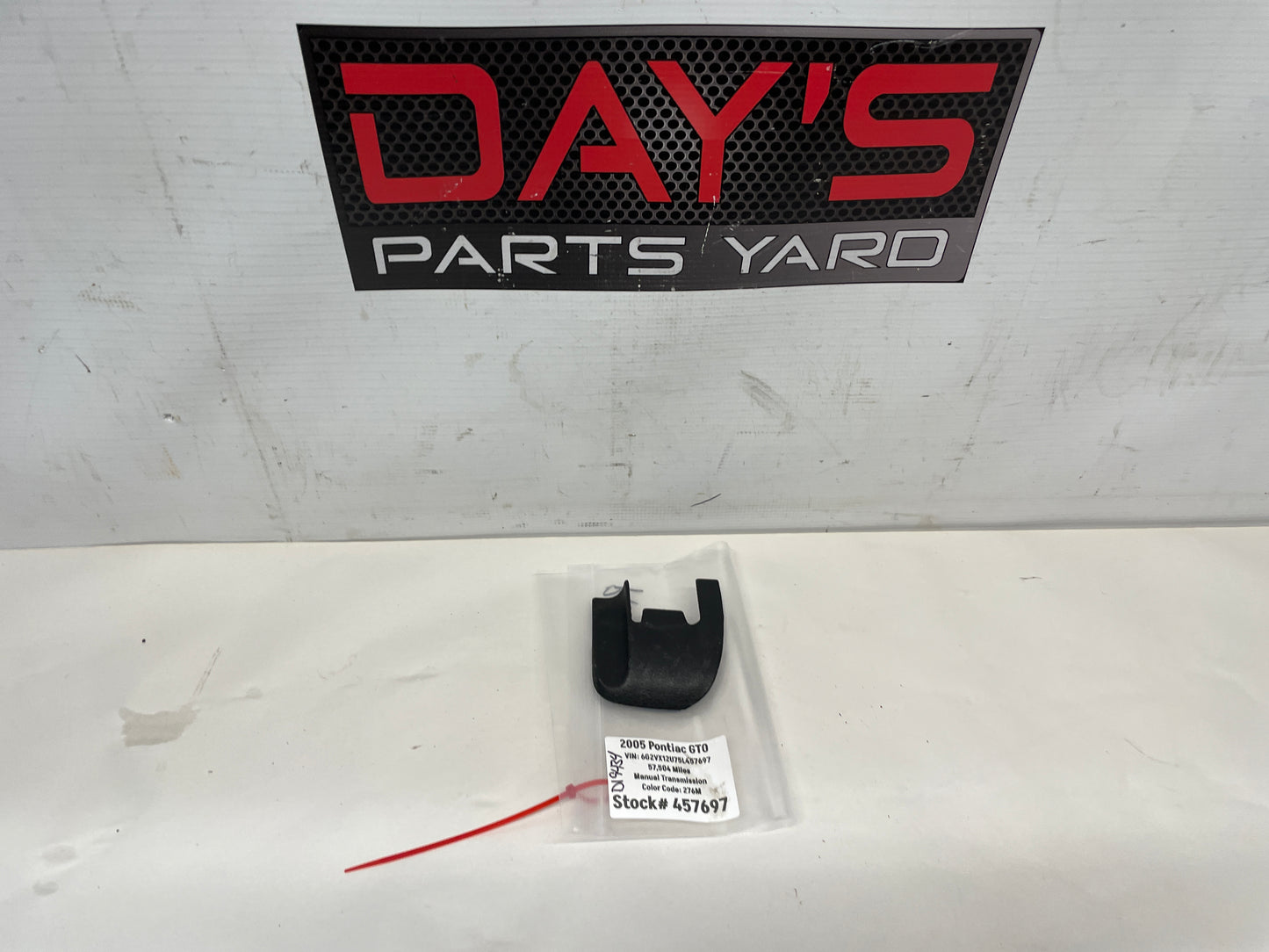2005 Pontiac GTO RH Passenger Seat Rail Track Bracket Plastic Cover OEM - Day's Parts Yard