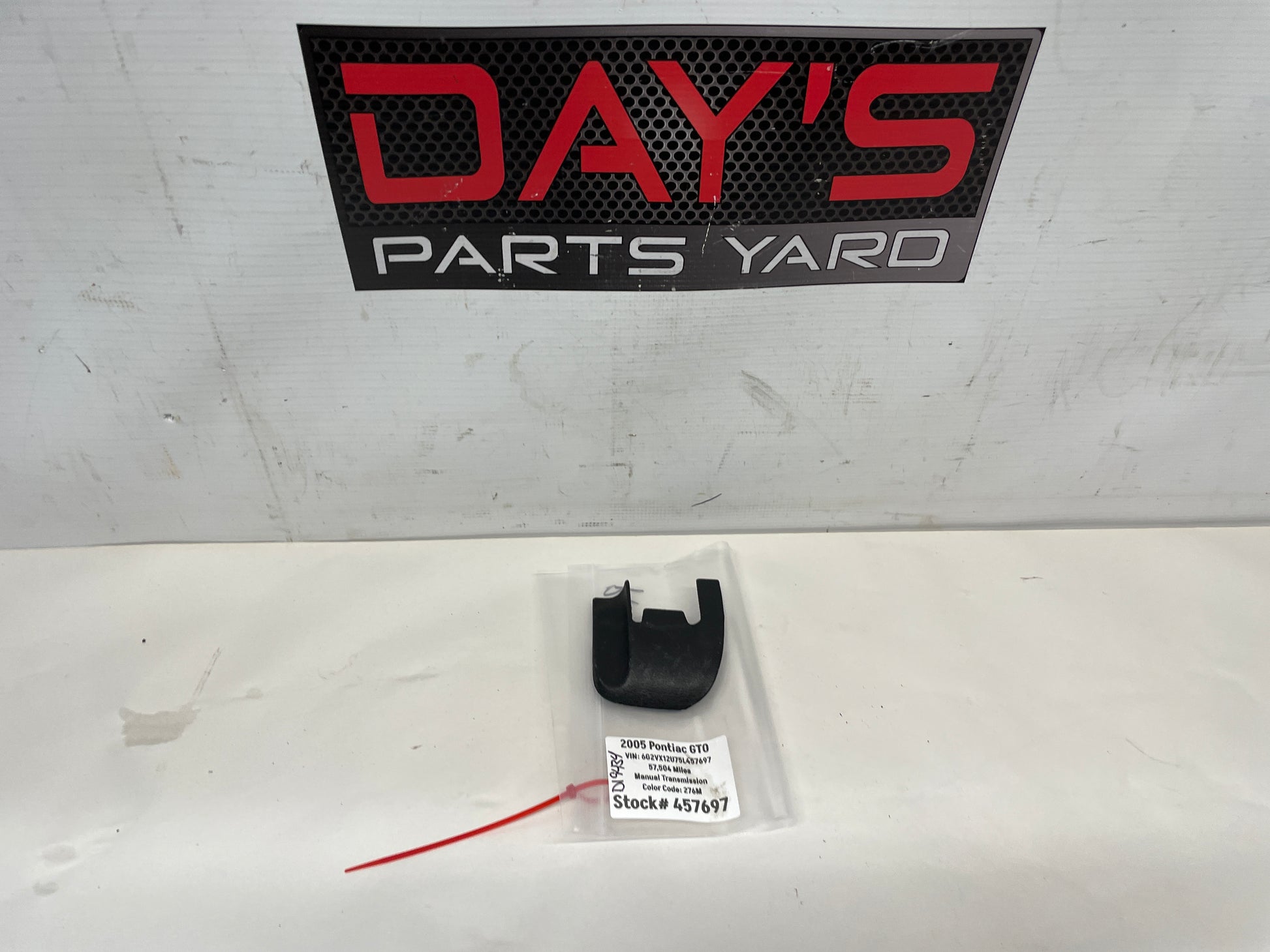 2005 Pontiac GTO RH Passenger Seat Rail Track Bracket Plastic Cover OEM - Day's Parts Yard
