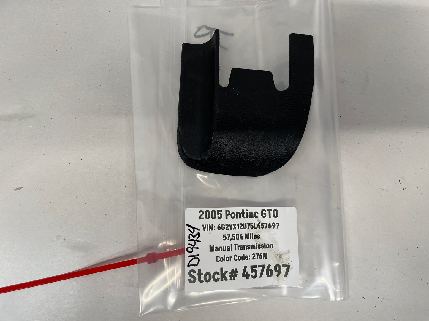 2005 Pontiac GTO RH Passenger Seat Rail Track Bracket Plastic Cover OEM - Day's Parts Yard