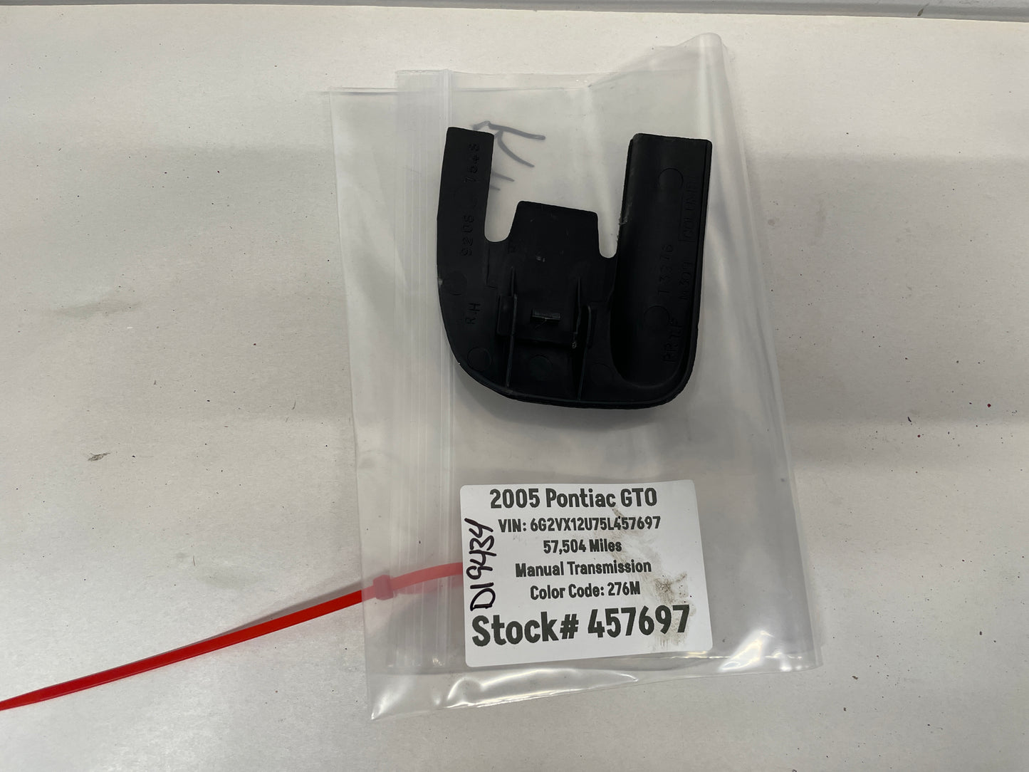 2005 Pontiac GTO RH Passenger Seat Rail Track Bracket Plastic Cover OEM - Day's Parts Yard