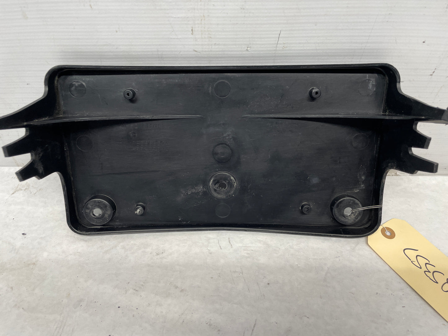 2006 Pontiac GTO Front Bumper Fascia License Plate Bracket OEM - Day's Parts Yard