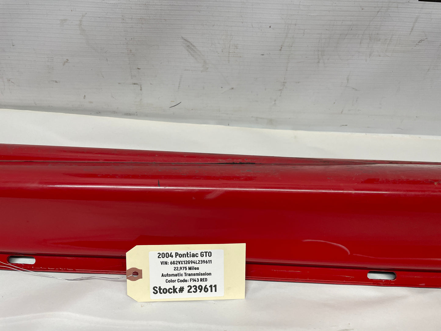 2004 Pontiac GTO LH Driver Rocker Molding Side Skirt Red OEM - Day's Parts Yard