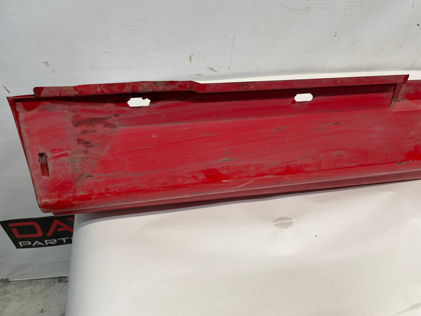 2004 Pontiac GTO LH Driver Rocker Molding Side Skirt Red OEM - Day's Parts Yard