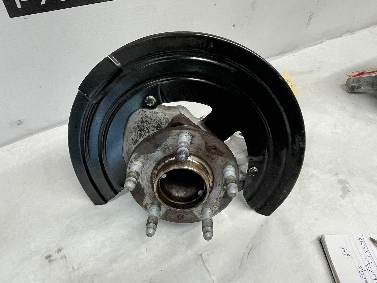 2014 Chevy SS Sedan LH Driver Front Spindle Hub Knuckle Wheel Bearing Assembly OEM - Day's Parts Yard