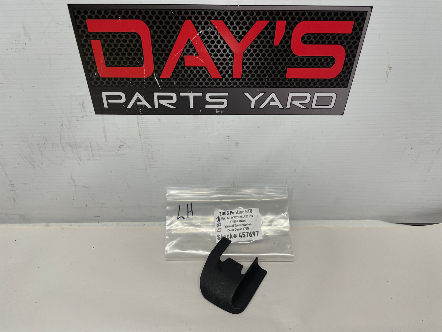 2005 Pontiac GTO LH Driver Seat Track Trim Plastic Bolt Cover OEM - Day's Parts Yard