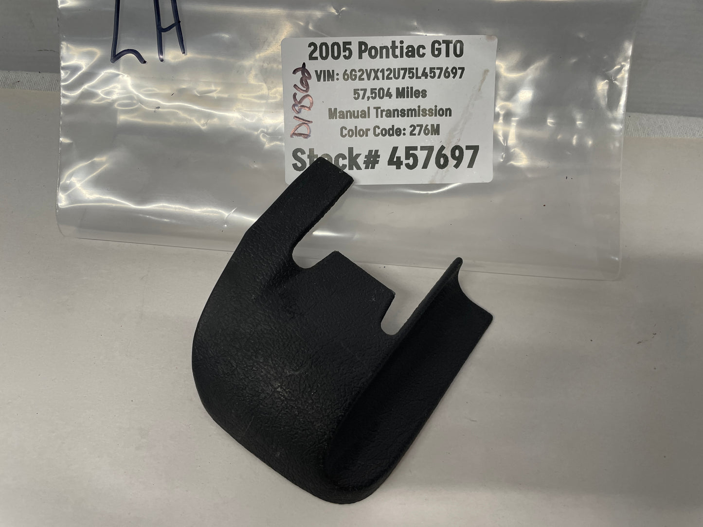 2005 Pontiac GTO LH Driver Seat Track Trim Plastic Bolt Cover OEM - Day's Parts Yard