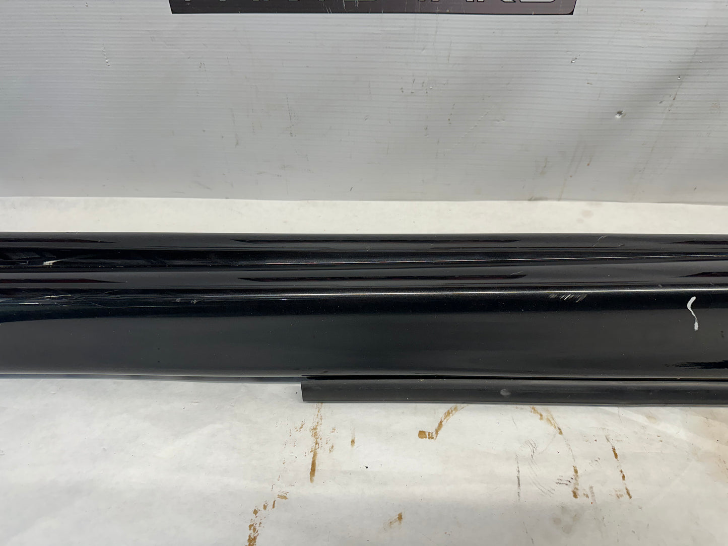 2006 Pontiac GTO LH Driver Rocker Molding Side Skirt Black OEM - Day's Parts Yard