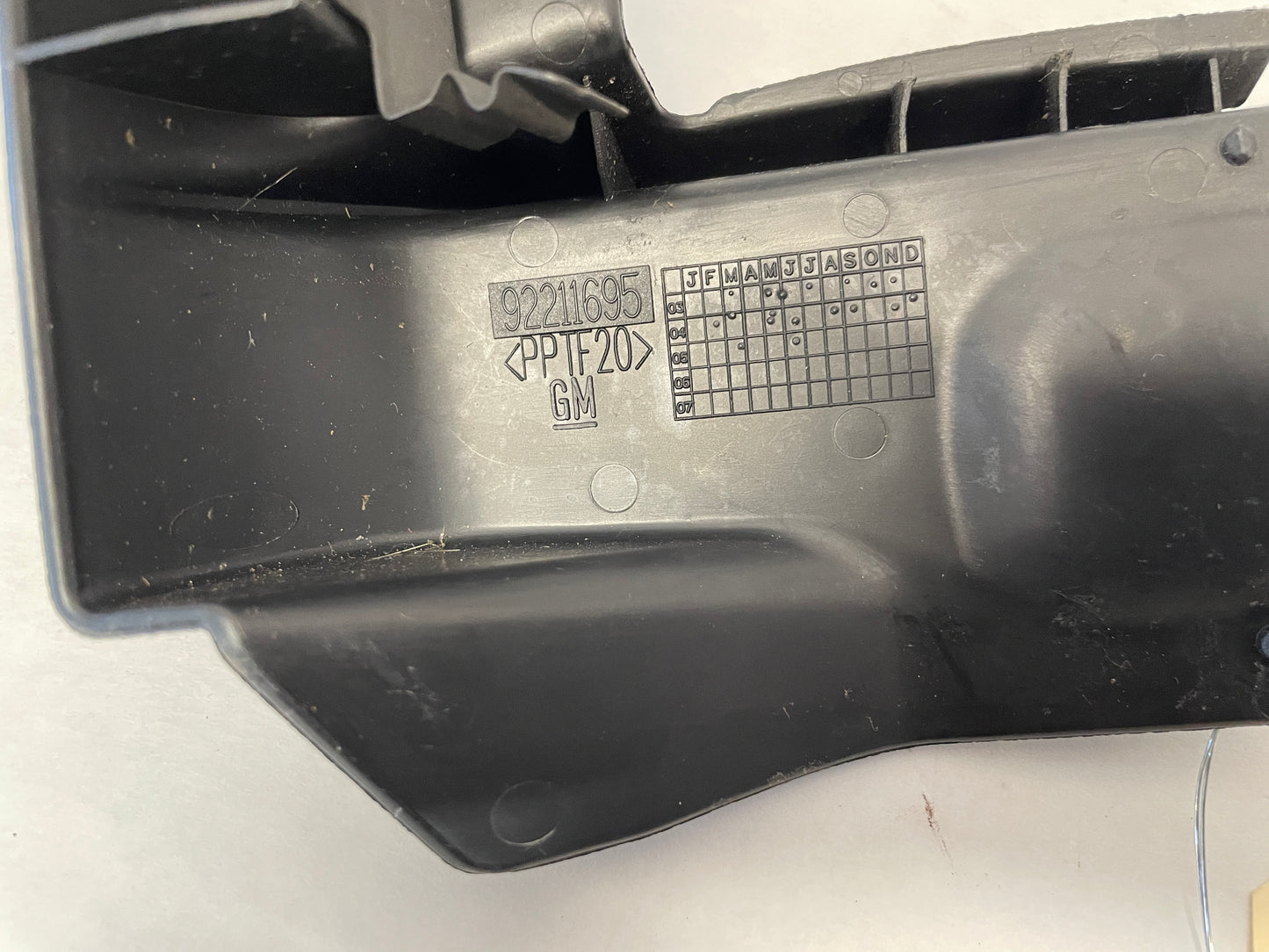 2006 Pontiac GTO LH Driver Seat Rail Track Bracket Trim Cover OEM - Day's Parts Yard