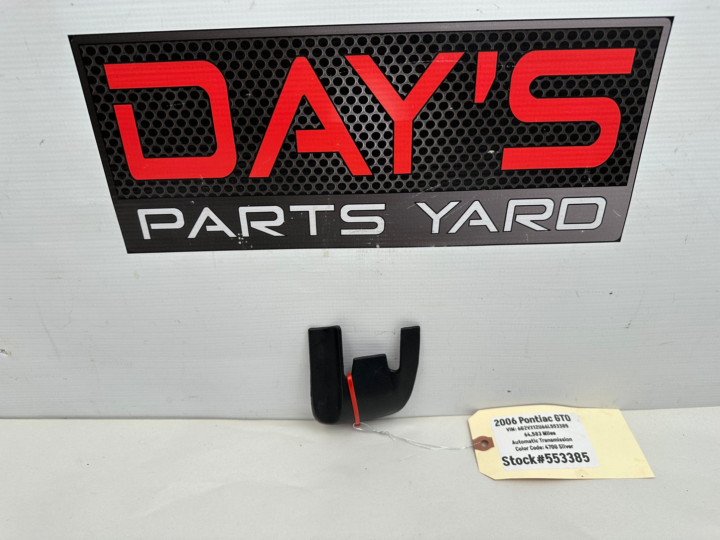 2006 Pontiac GTO RH Passenger Seat Rail Track Bracket Plastic Cover OEM - Day's Parts Yard