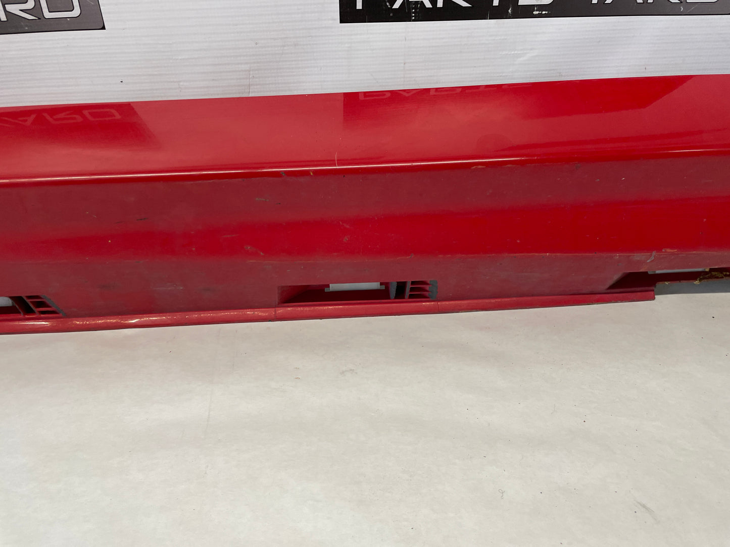 2009 Pontiac G8 LH Driver Rocker Molding Side Skirt Panel Trim Red OEM - Day's Parts Yard