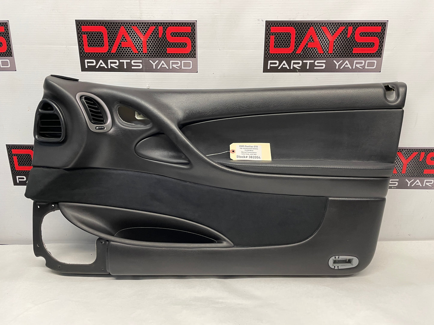 2005 Pontiac GTO RH Passenger Front Interior Door Panel Trim OEM - Day's Parts Yard
