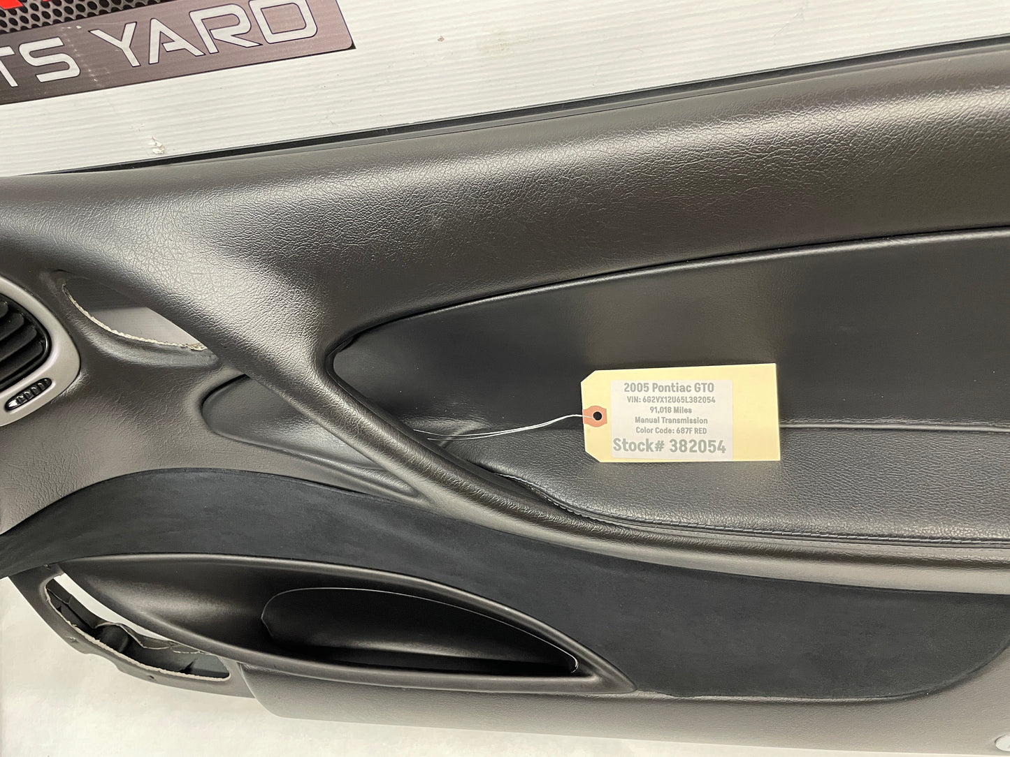2005 Pontiac GTO RH Passenger Front Interior Door Panel Trim OEM - Day's Parts Yard