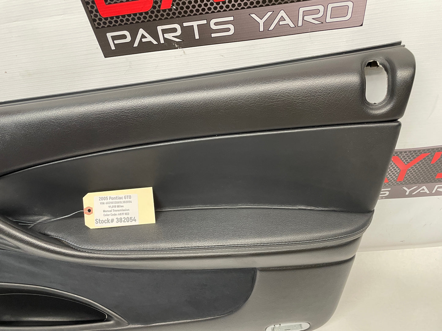 2005 Pontiac GTO RH Passenger Front Interior Door Panel Trim OEM - Day's Parts Yard