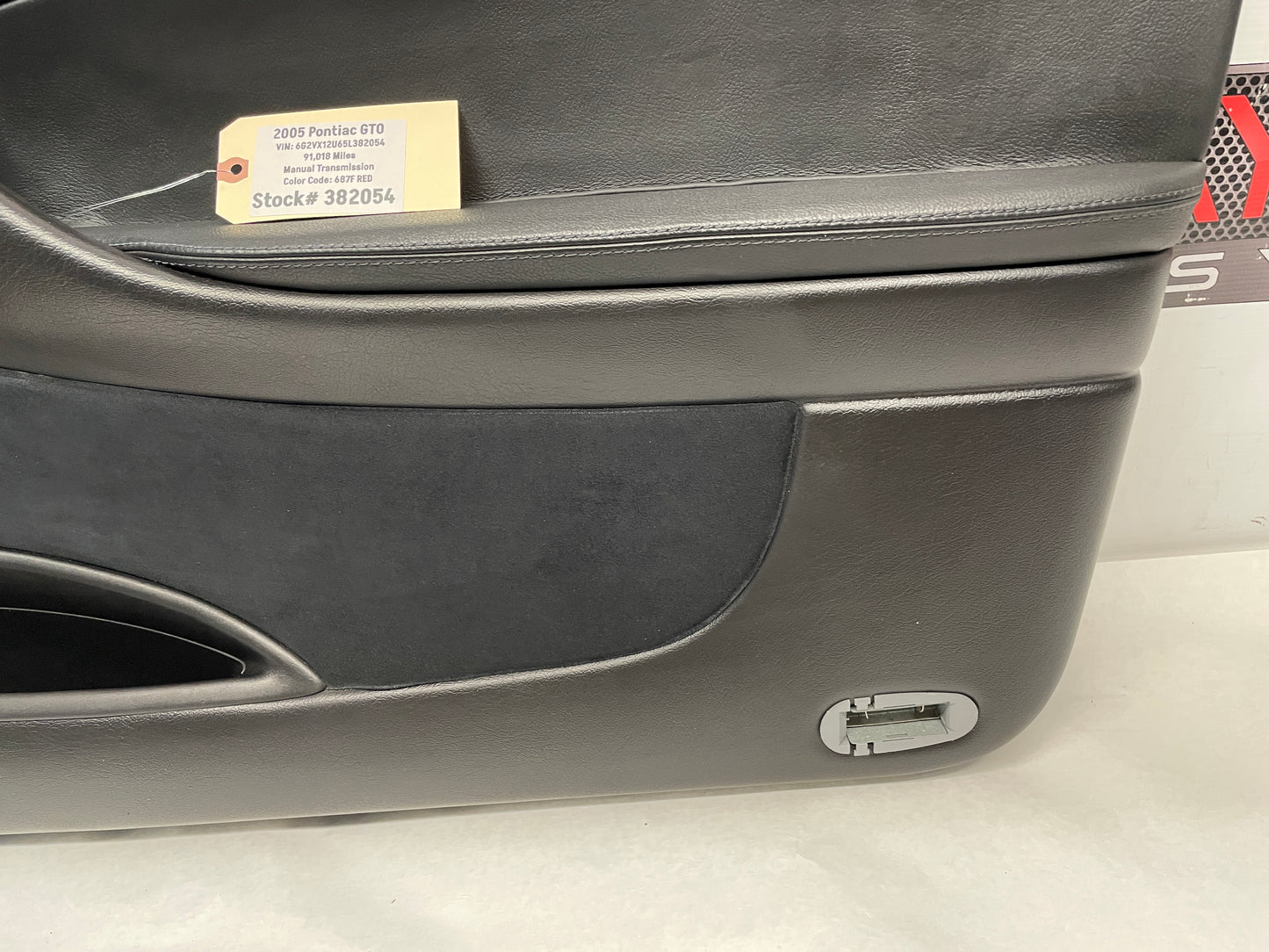2005 Pontiac GTO RH Passenger Front Interior Door Panel Trim OEM - Day's Parts Yard