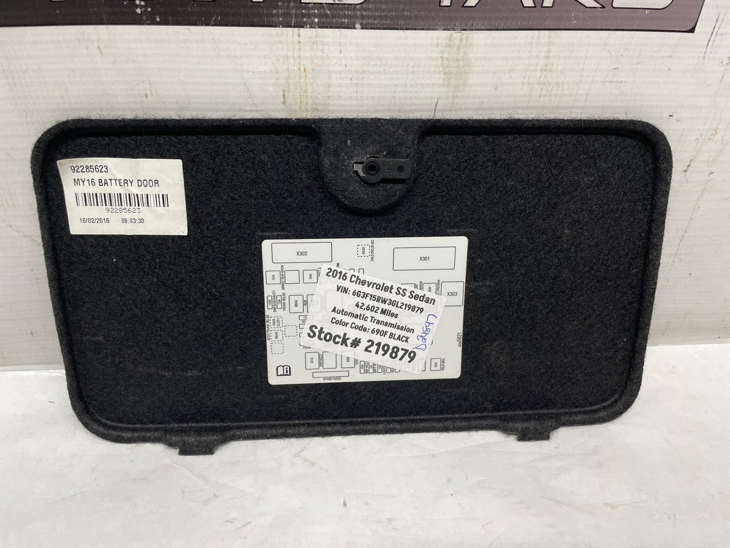 2016 SS Sedan Battery Stowage Access Hole Door Trim Felt Carpet OEM - Day's Parts Yard