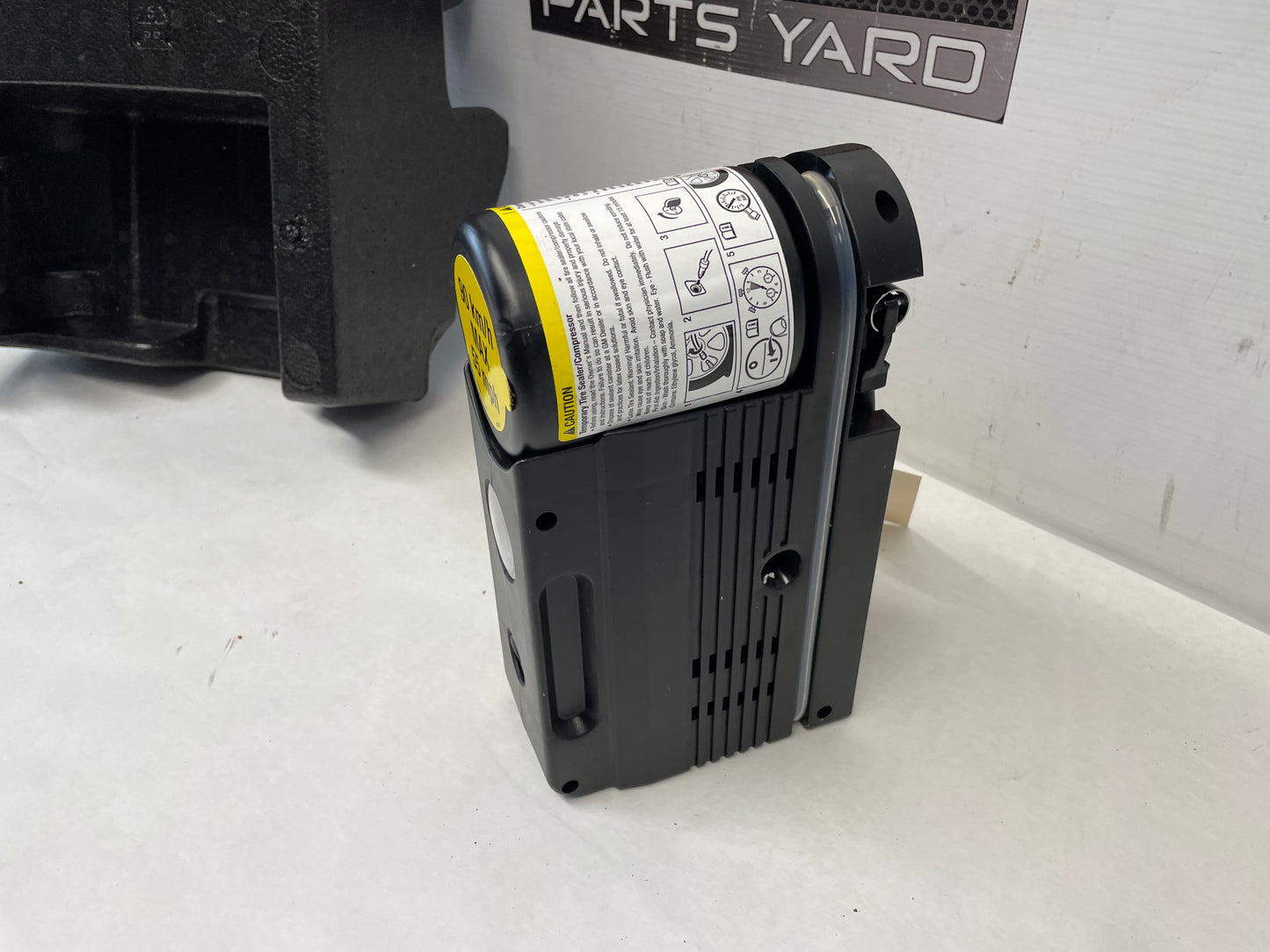 2017 Chevy SS Sedan Spare Tire Sealant Container & Compressor Assembly OEM - Day's Parts Yard