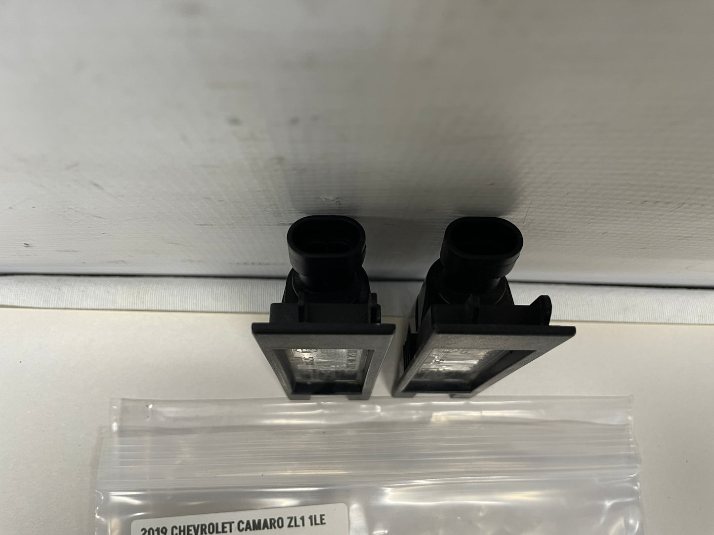 2019 Chevy Camaro ZL1 RH & LH License Plate Tag Lights OEM - Day's Parts Yard