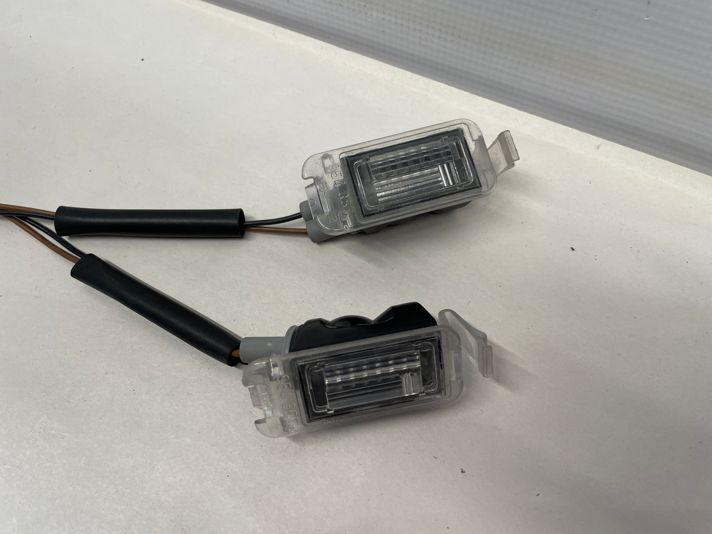 2006 Pontiac GTO License Plate Tag Lights RH & LH OEM - Day's Parts Yard
