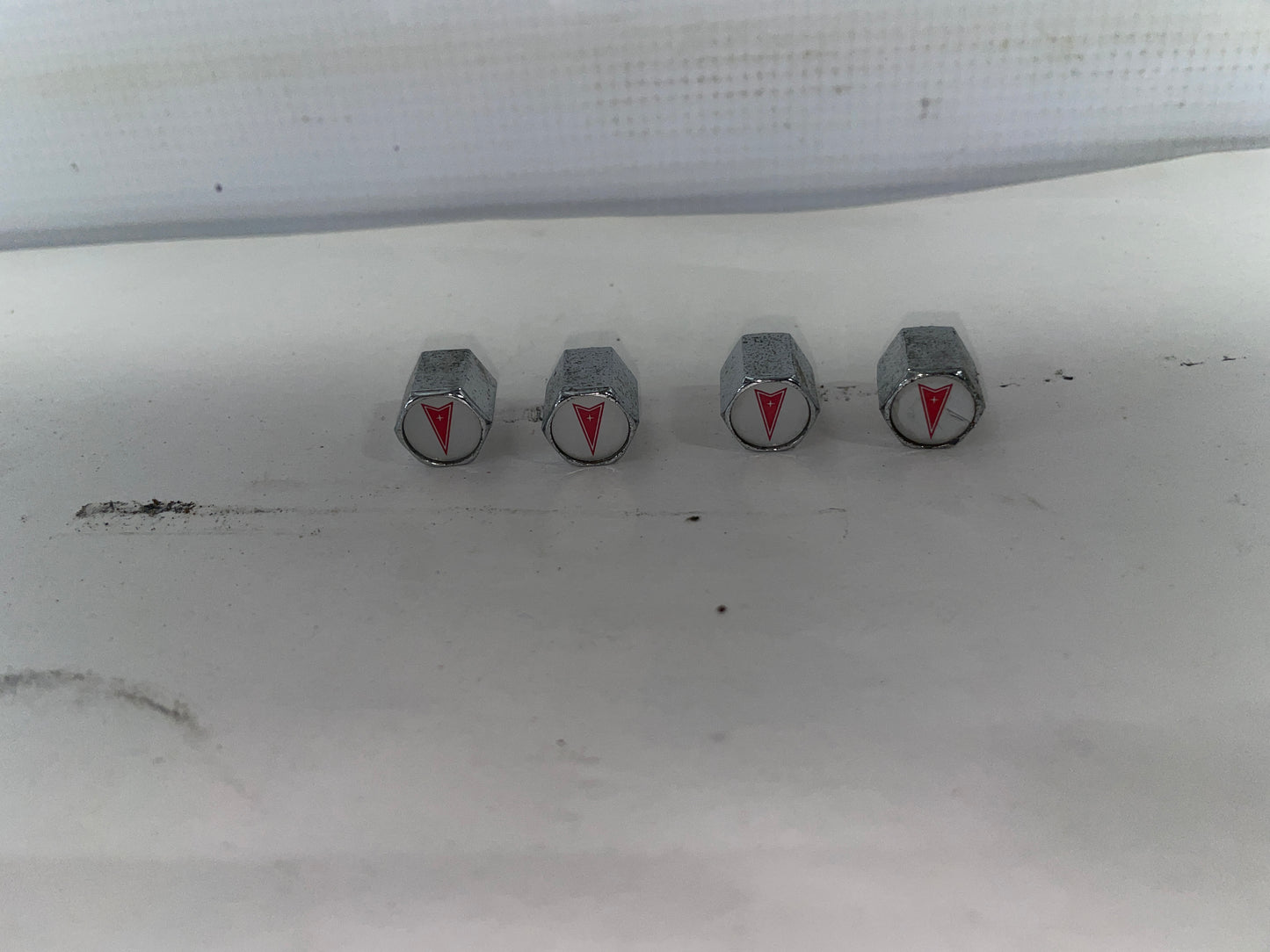 2006 Pontiac GTO Arrowhead Valve Stem Caps Set - Day's Parts Yard