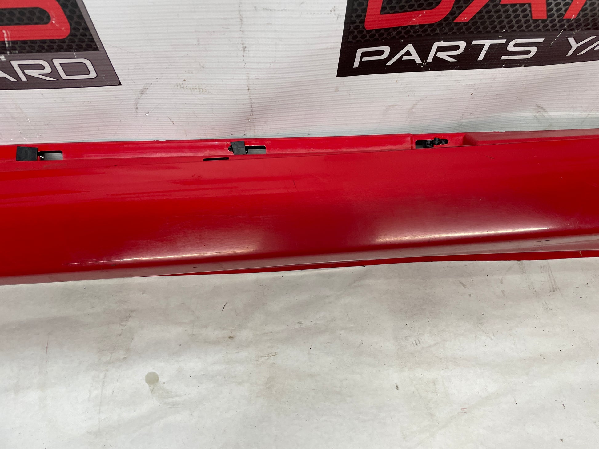2009 Pontiac G8 LH Driver Rocker Molding Side Skirt Panel Red OEM - Day's Parts Yard