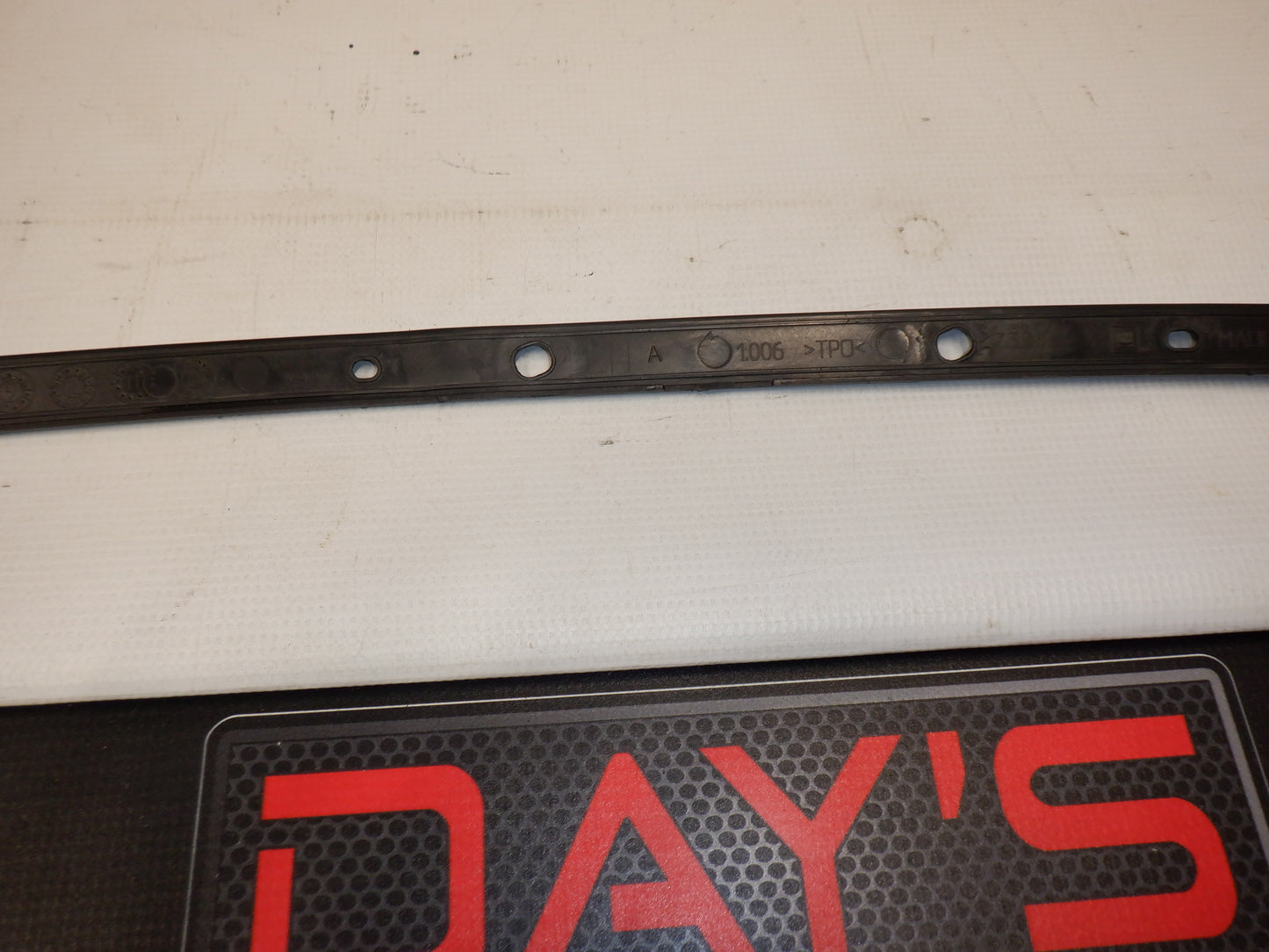 2010-2015 Chevy Camaro Bumper Trim LH 92238867 OEM - Day's Parts Yard