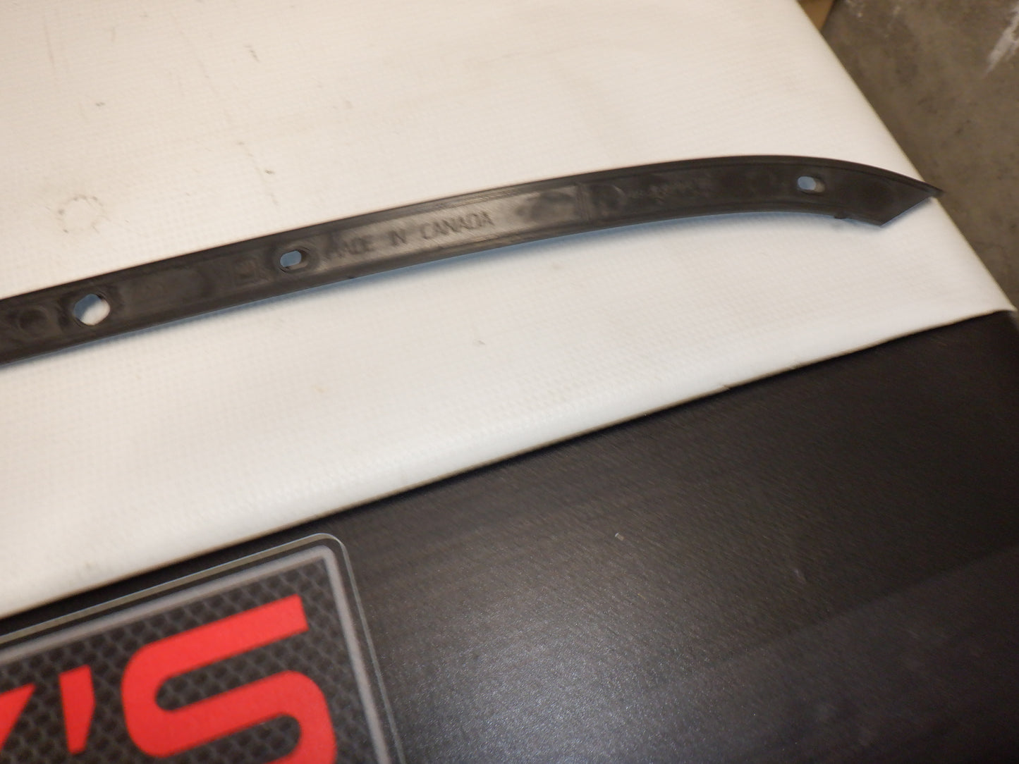 2010-2015 Chevy Camaro Bumper Trim LH 92238867 OEM - Day's Parts Yard