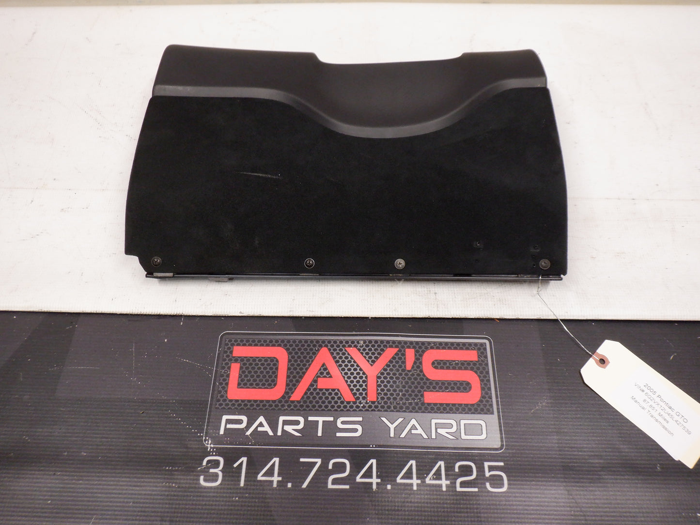 2005 Pontiac GTO Black Suede Knee Bolster Fuse Cover OEM - Day's Parts Yard