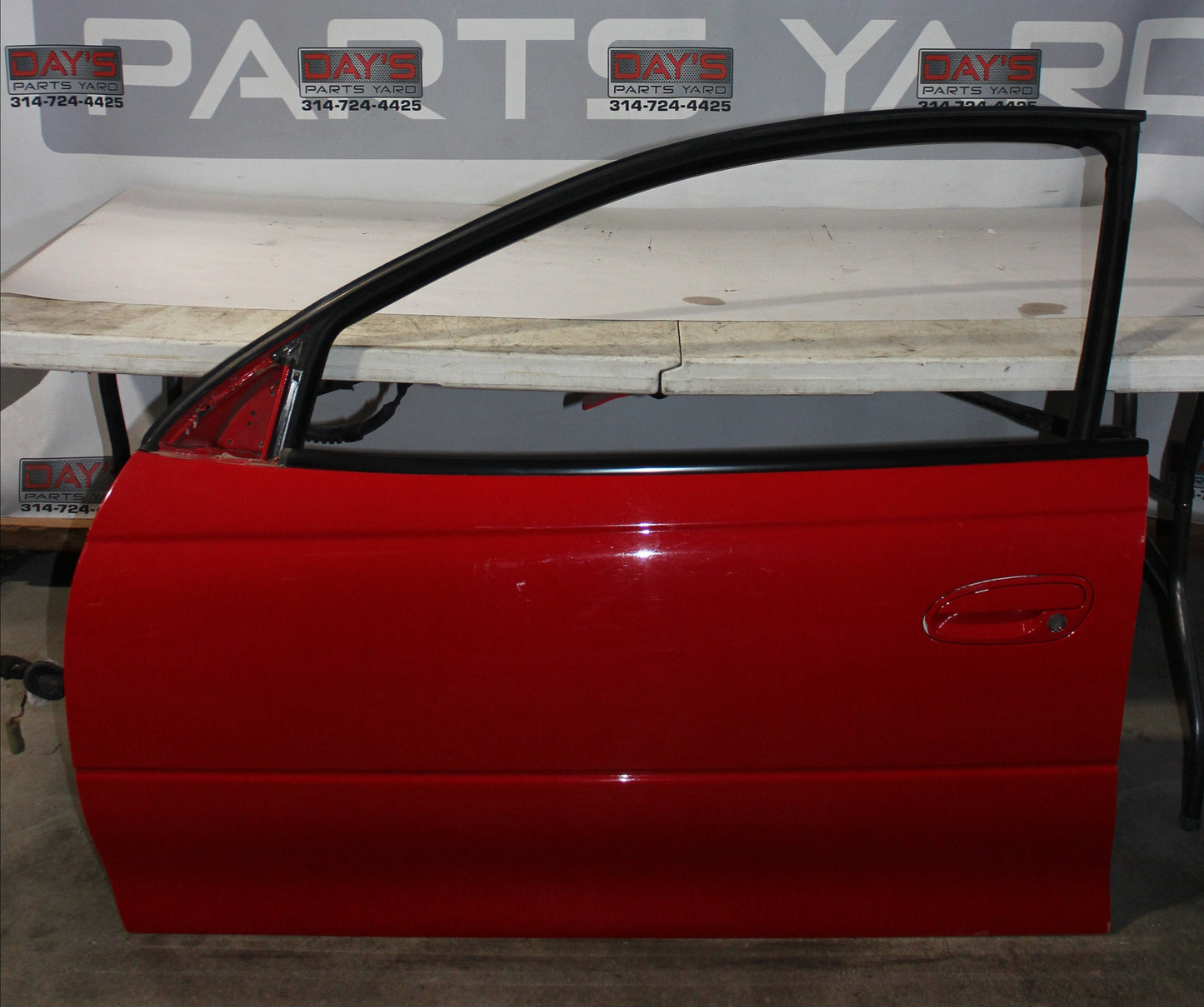 2006 Pontiac GTO LH Driver Front Exterior Door Red OEM - Day's Parts Yard