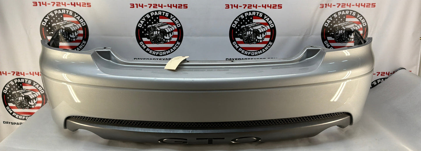 2005 Pontiac GTO Rear Bumper Cover w/ Lower Insert Valance Diffuser Panel Silver OEM