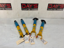 Bolstering front and rear strut shocks - Day's Parts Yard