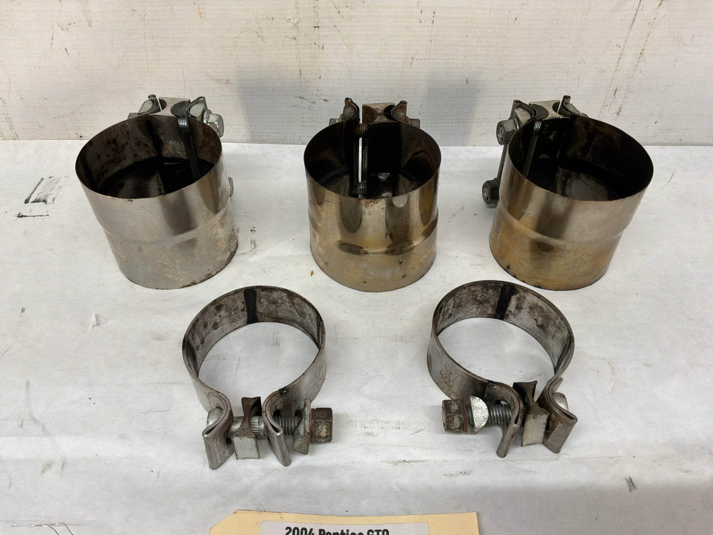 2004 Pontiac GTO Factory Exhaust Muffler Clamps w/ Intermediate Pipe Clamps OEM