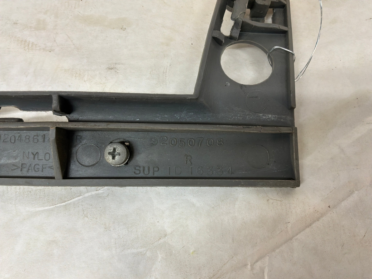 2005 Pontiac GTO RH & LH Front Bumper Fender Bracket Guide Supports  OEM