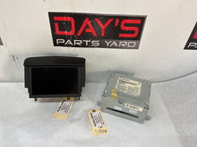Navigation screen and radio - Day's Parts Yard