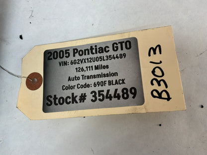 2005 Pontiac GTO Black Suede Lower Dash Knee Bolster Fuse Cover OEM