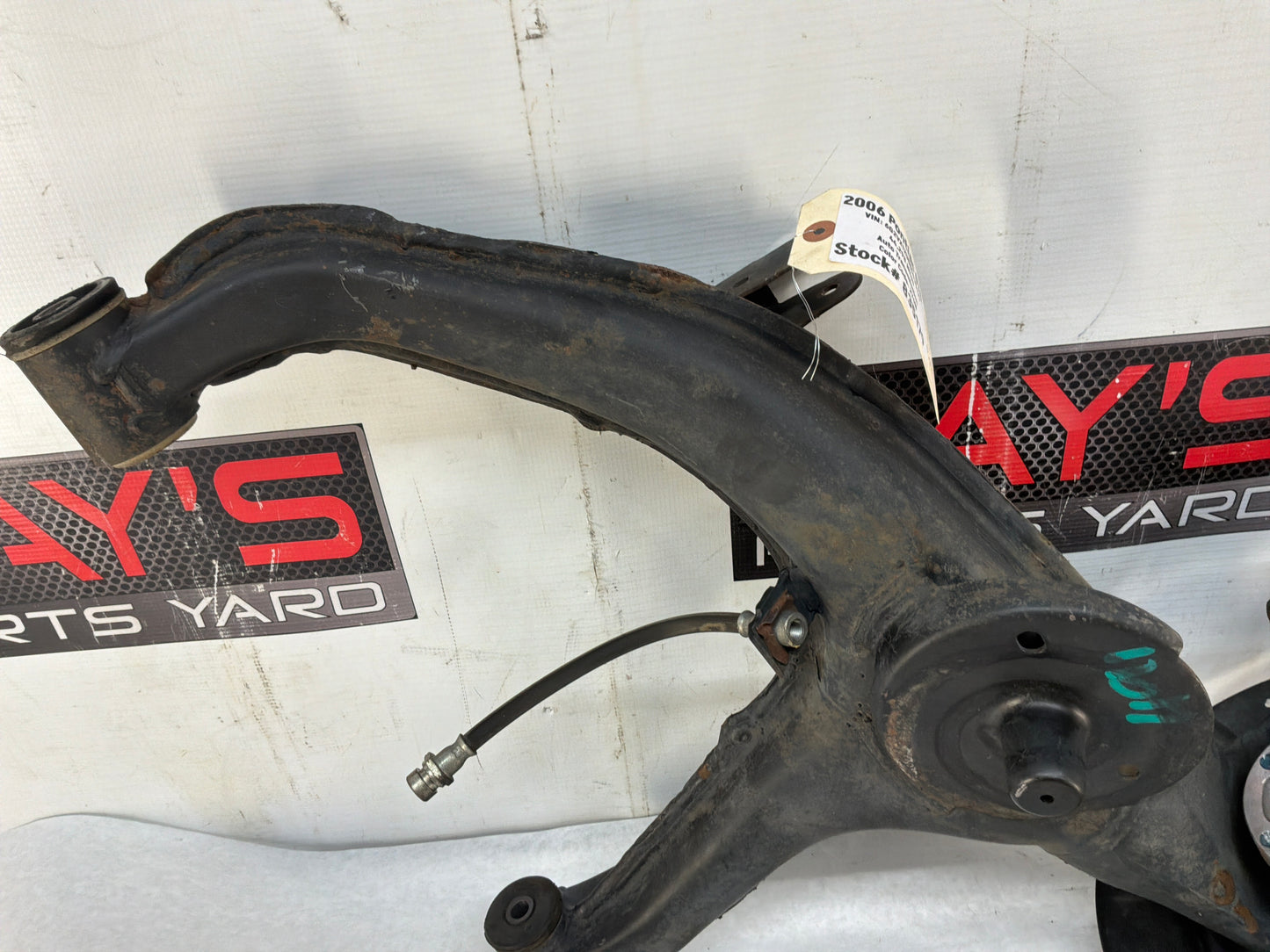 2006 Pontiac GTO LH Driver Rear Suspension Spindle Hub Knuckle Control Arm OEM