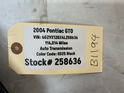 2004 Pontiac GTO Black Suede Knee Bolster Fuse Cover OEM