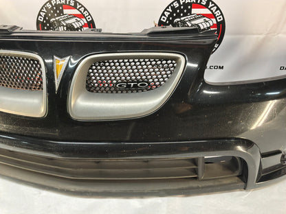2005 Pontiac GTO SAP Complete Front Bumper Cover Fascia Black OEM