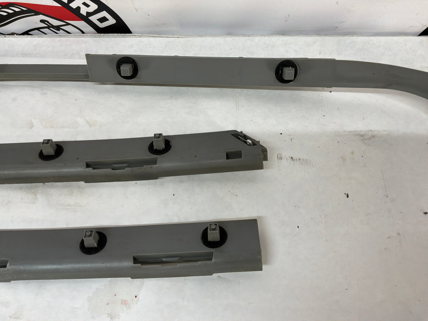 2005 Pontiac GTO RH & LH Rear Bumper Brackets Guides Supports OEM