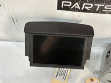 Navigation screen and radio - Day's Parts Yard