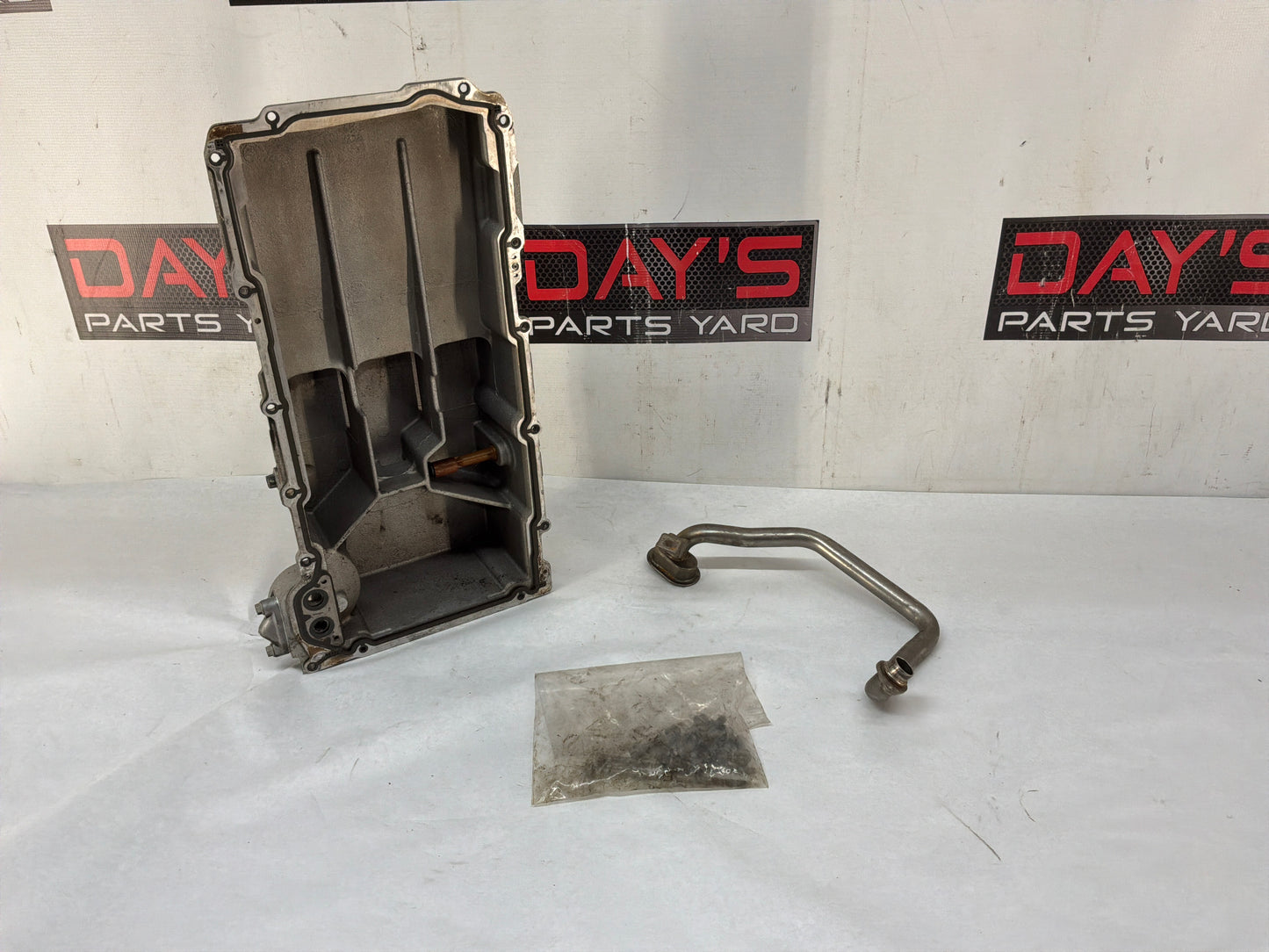 Oil pan w pick up tube - Day's Parts Yard