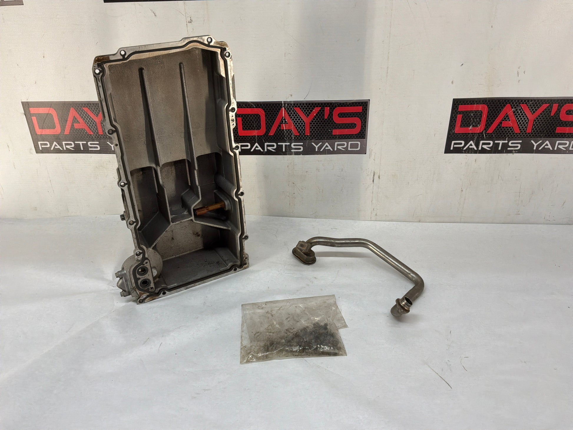 Oil pan w pick up tube - Day's Parts Yard