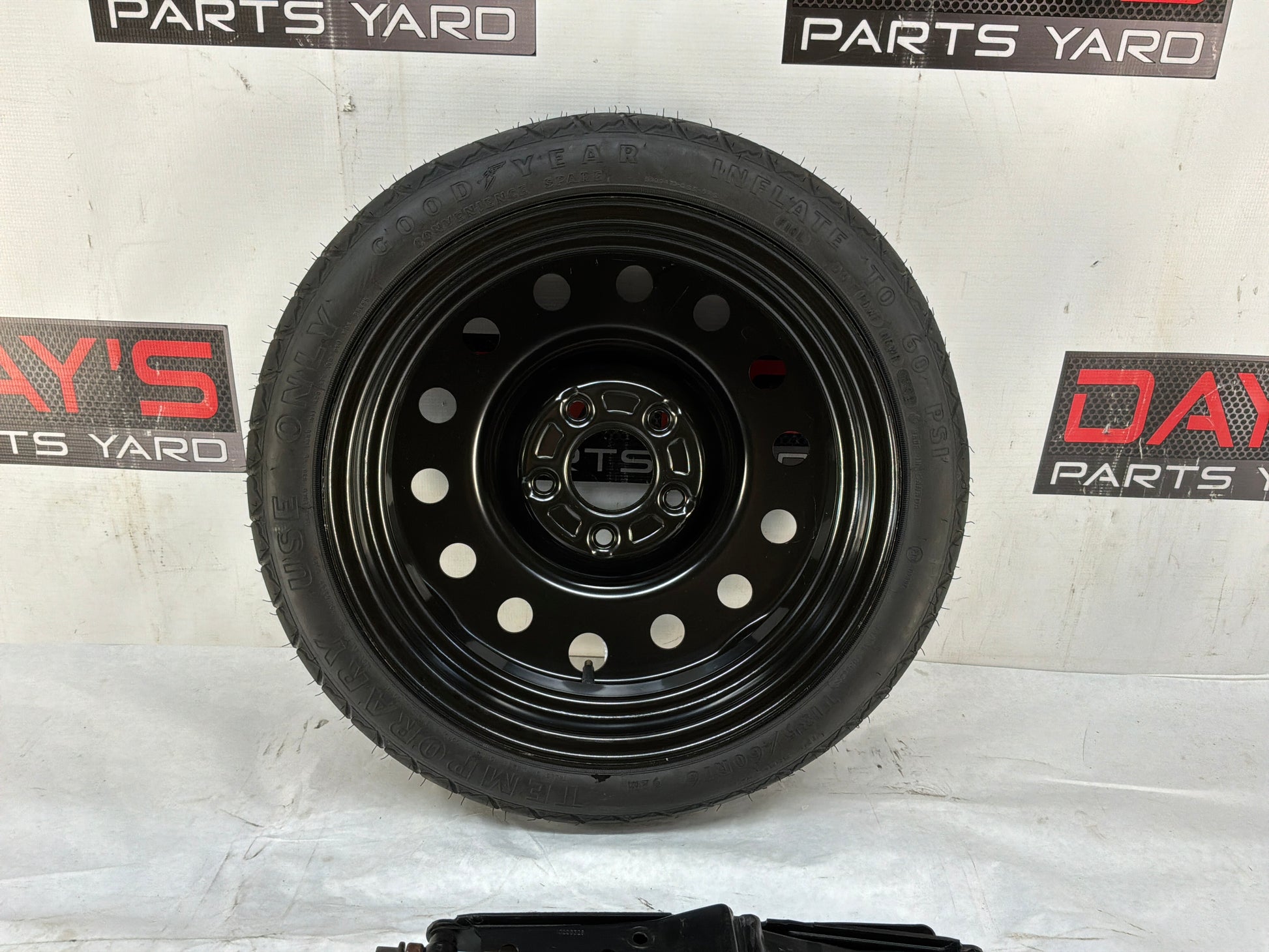 Spare tire w Jack kit - Day's Parts Yard