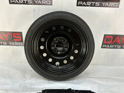 Spare tire w Jack kit - Day's Parts Yard