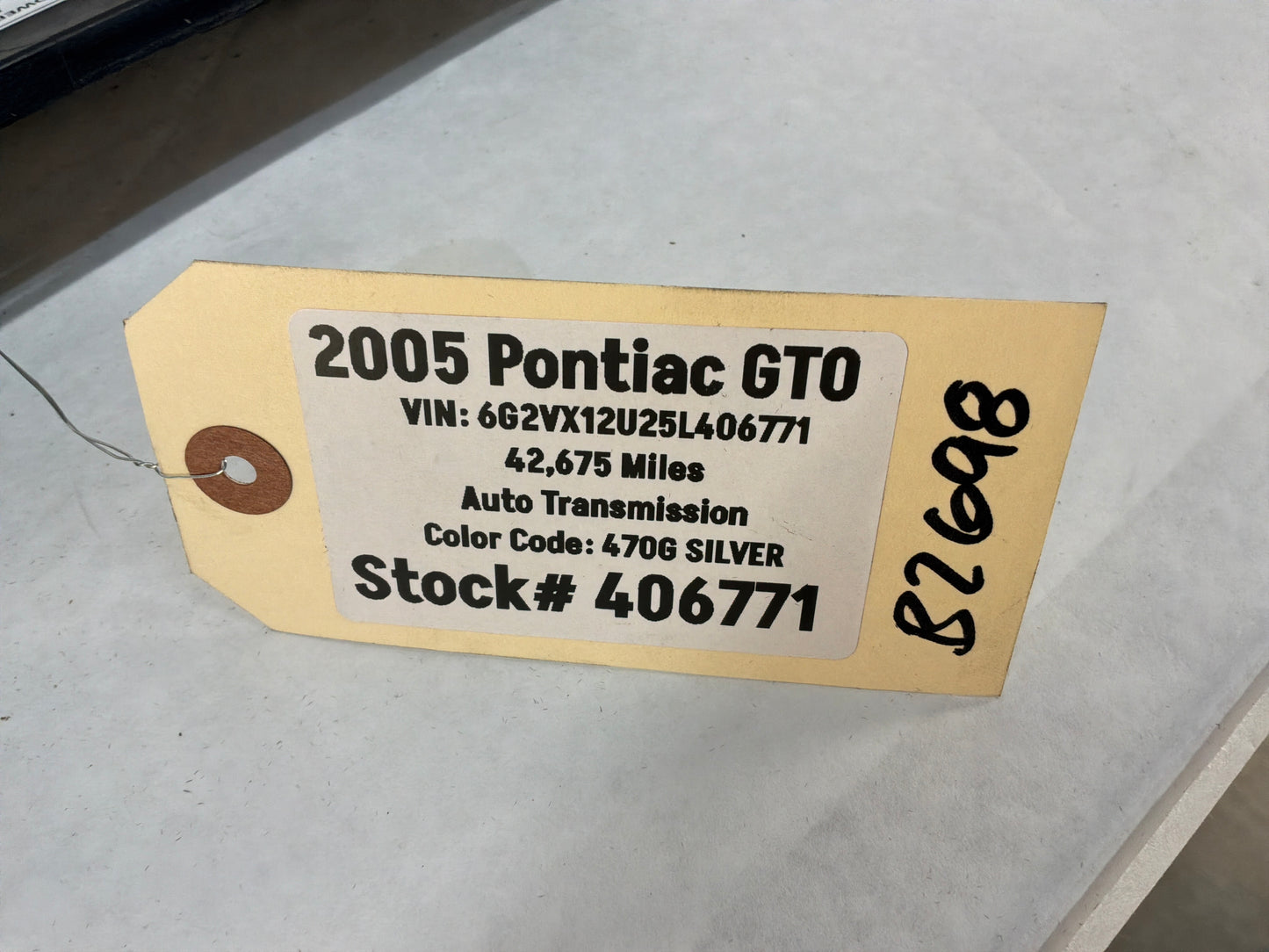 2005 Pontiac GTO Black Suede Lower Dash Knee Bolster Fuse Cover OEM